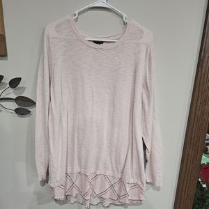 Torrid, size 3x, long sleeve blouse with pink plaid detail on bottom.